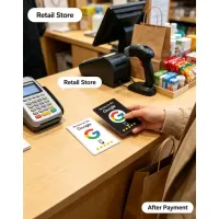Customer taps the Google review card at a retail store counter after paying