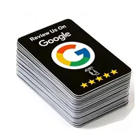 Stack of Review Us On Google NFC cards, black NFC side up